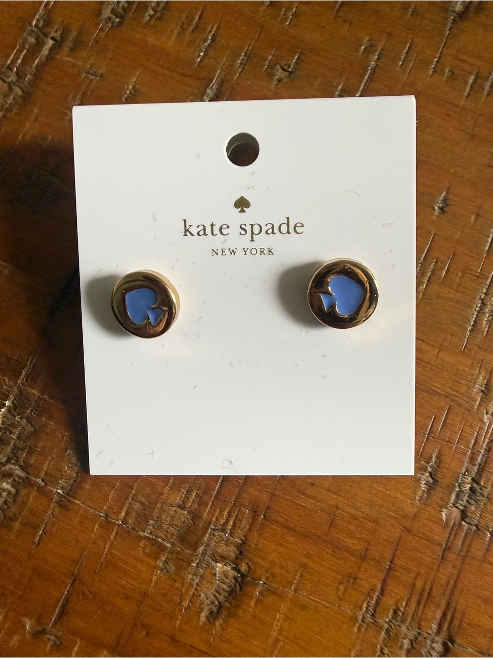 kate spade gold-tone stud earrings with blue spade centers